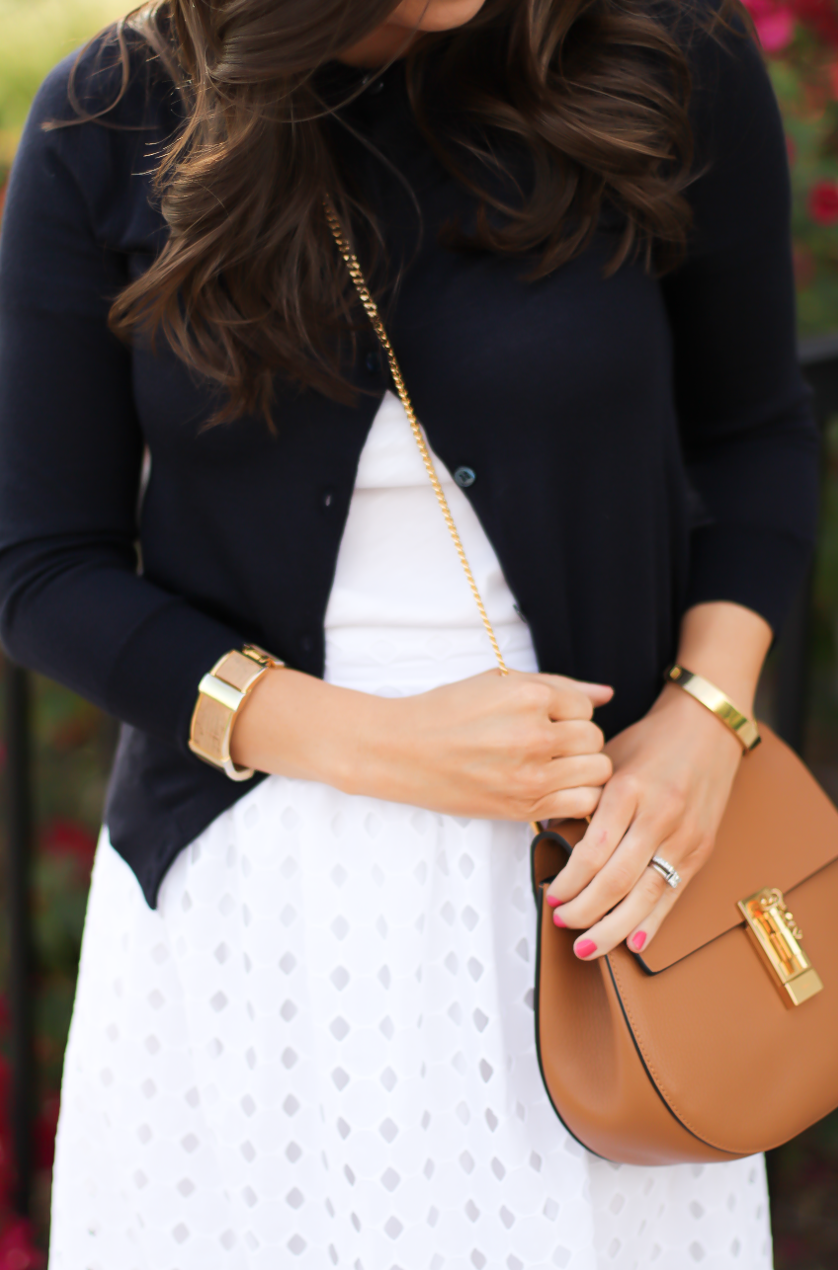 White Eyelet Midi Skirt, Navy Cardigan, Tan Wedge Sandals, Tan Chain Strap Crossobdy Bag, Revolve Clothing, J.Crew, Chloe, Seychelles 15