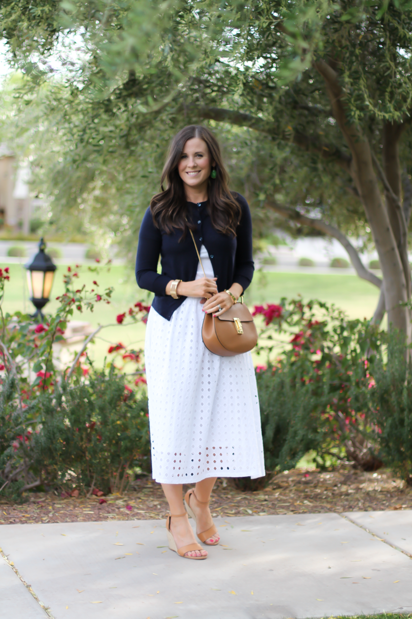 White Eyelet Midi Skirt, Navy Cardigan, Tan Wedge Sandals, Tan Chain Strap Crossobdy Bag, Revolve Clothing, J.Crew, Chloe, Seychelles 3