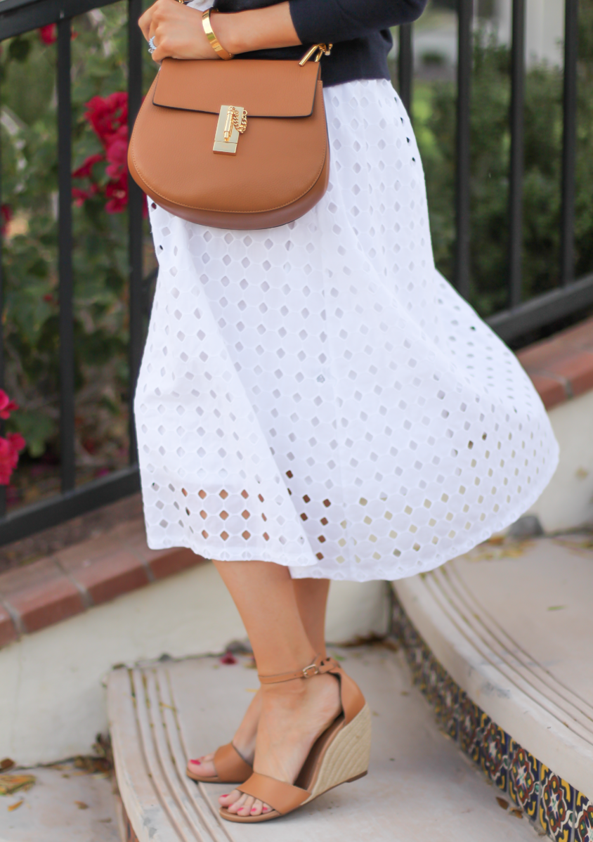 White Eyelet Midi Skirt, Navy Cardigan, Tan Wedge Sandals, Tan Chain Strap Crossobdy Bag, Revolve Clothing, J.Crew, Chloe, Seychelles 9