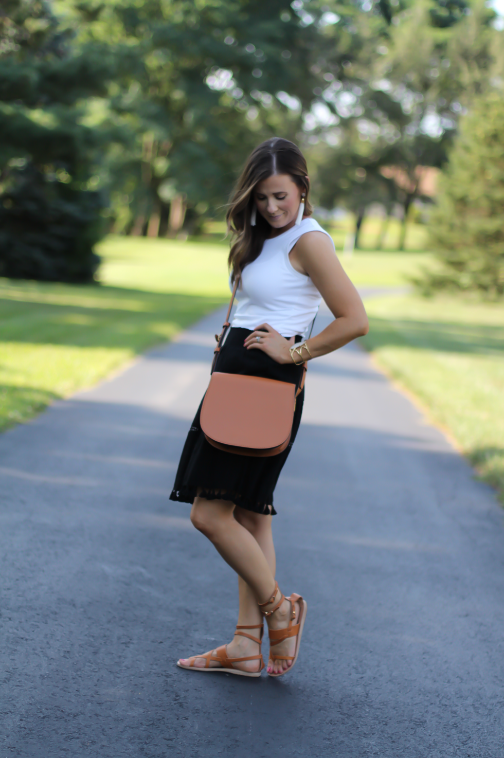 Black Tassel Skirt, White Sleeveless Tee, Tan Gladiator Sandals, White Tassel Earrings, Tan Saddlebag, Loft, J.Crew, Tory Burch, Ancient Gladiator