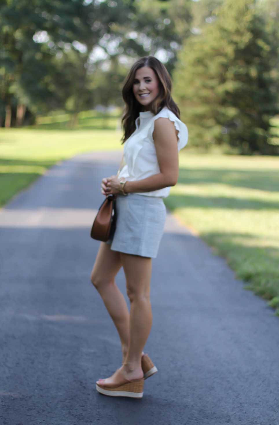 Grey Tweed Shorts, Ivory Ruffle Trim Sleeveless Top, Tan Wedge Platform Sandals, Tan Chain Strap Crossbody, Loft, Banana Republic, Ferragamo, Chloe, Stella & Dot